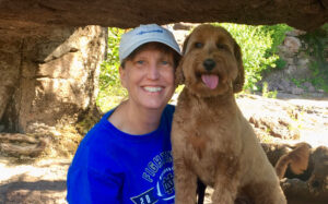 Rachel Henrichs with her golden doodle dog named Holly