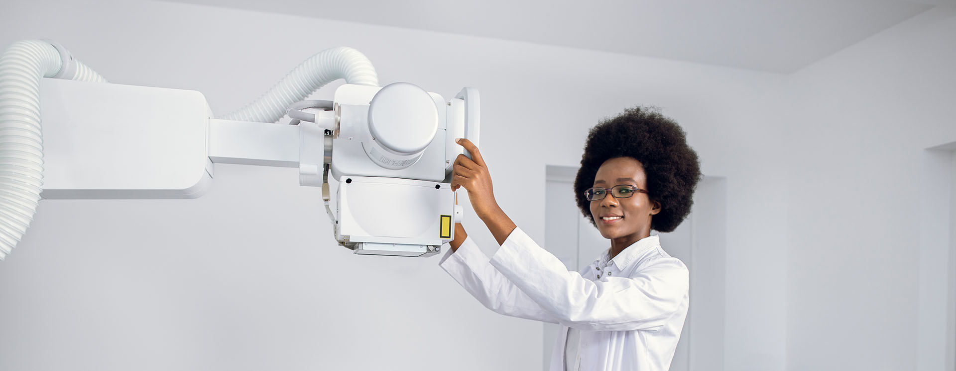 A radiology technician prepares to give a patient an ultrasound.