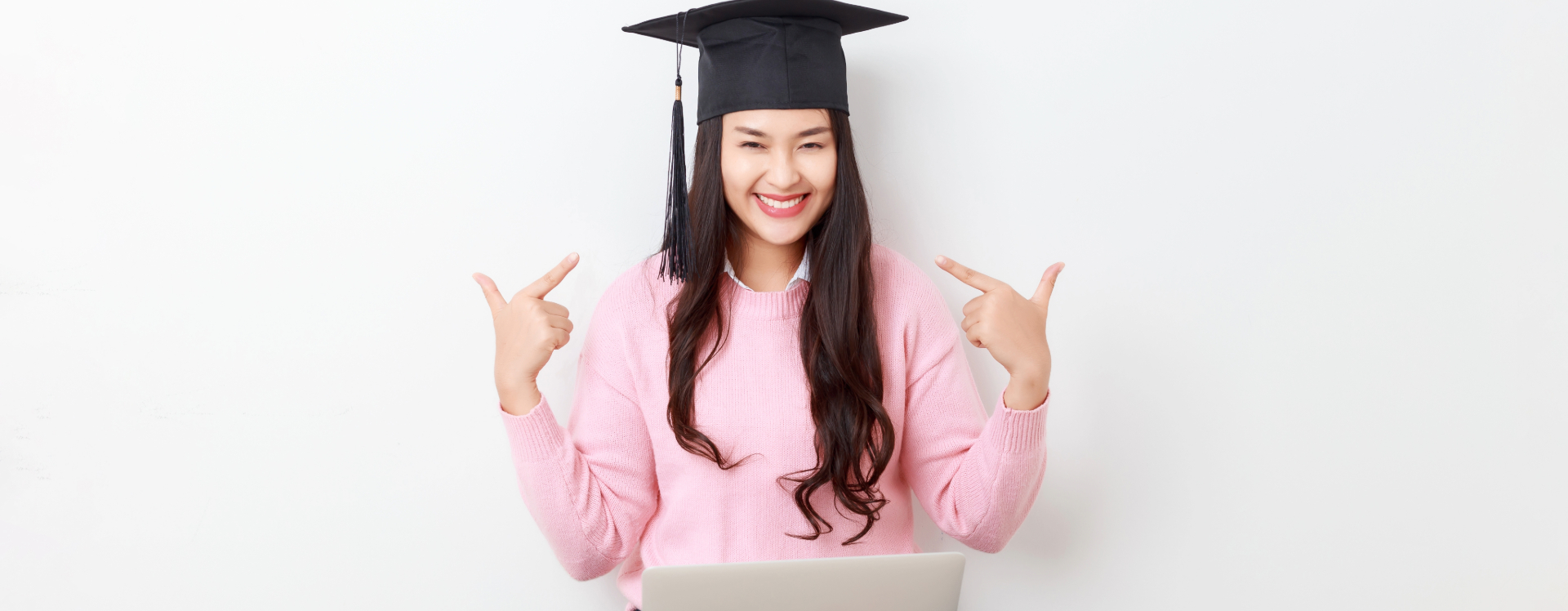 female college student wearing a graduation cap