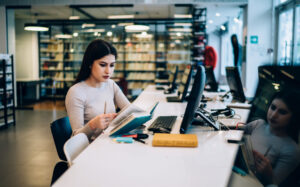 woman studying in front of computer